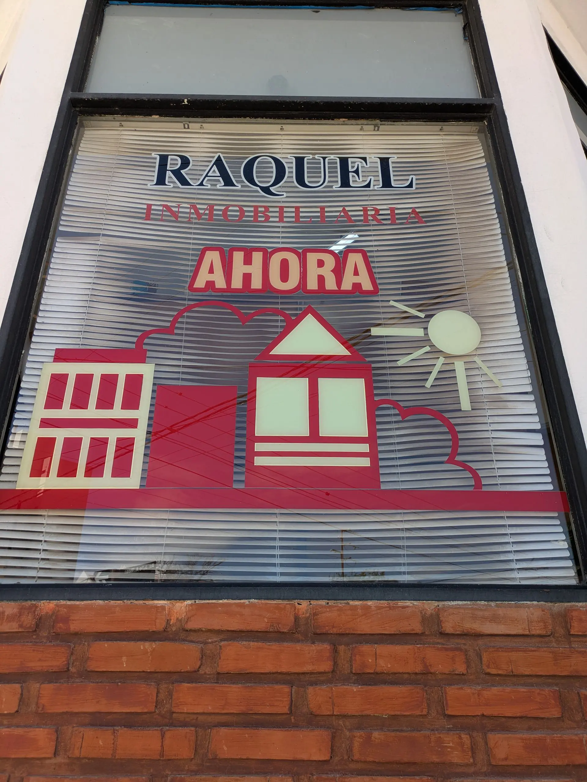 Vidriera Raquel Inmobiliaria